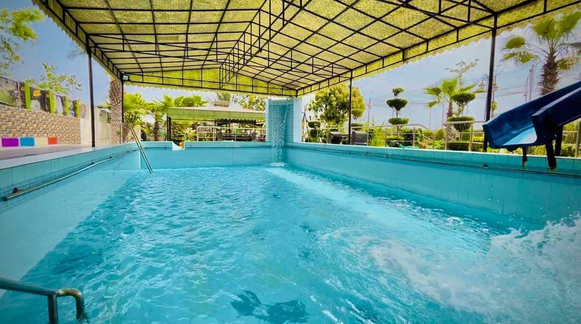 Covered pool waterfall